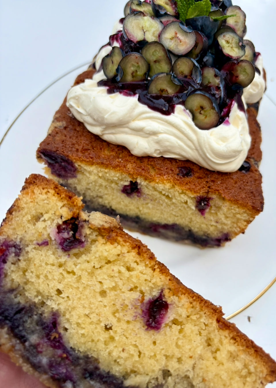 Blueberry and White Chocolate Loaf Cake topped with Vanilla Fresh Cream, Blueberry compote and Fresh Blueberries ❤️